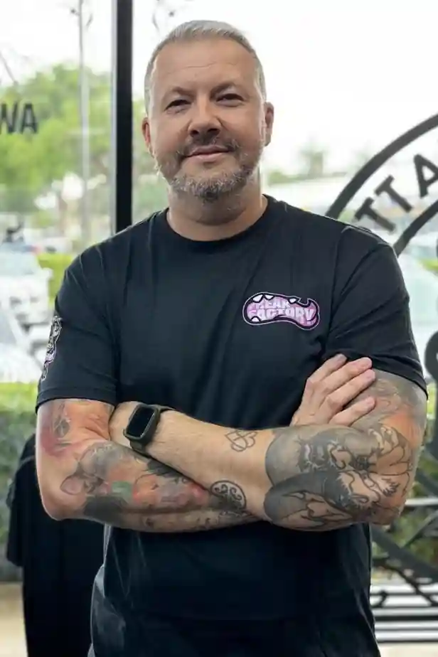 Neto Tattoo Artist specializing in watercolor tattoos and cover ups in Boca Raton